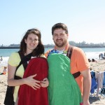 Our little family on the beach, JD and Holly wrapped in towels to shield the wind. 